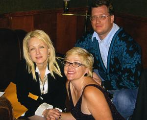 Cyndi and Mary Kay, with me  unaware I was in the shot, circa 2002.  The envelope under Ms Lauper's arm contains Fade.